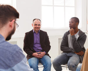 Men in group session at Los Angeles mens rehab centers